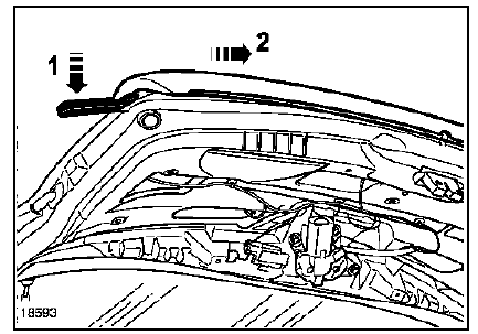 Insérer l'outil de dépose des vitres de rétroviseur