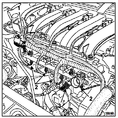 Déposer les vis de la cale porte-injecteurs.