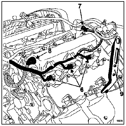 Desserrer progressivement les vis des carters couvre-arbres à cames.